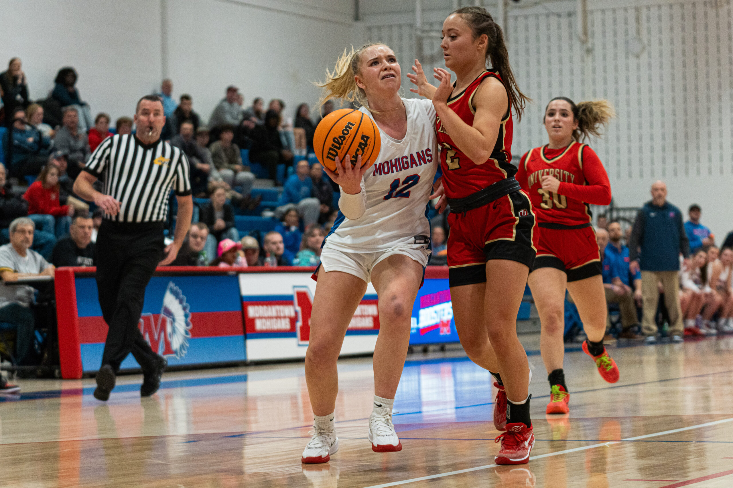 Kellogg, DeVries take charge early, lead No. 1 MHS girls' hoops past rival UHS